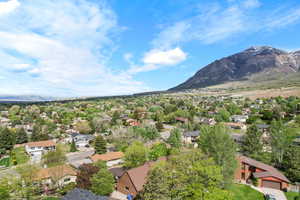 Aerial view of residential area with mountains