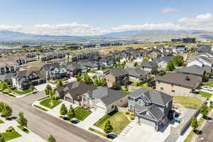 Aerial view of residential area with a mountain backdrop