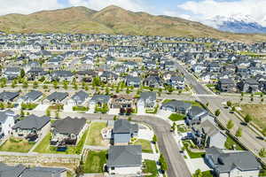 View of property location featuring nearby suburban area and a mountainous background