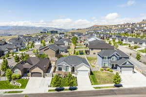 Aerial view of residential area featuring mountains