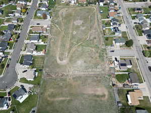 View of property location featuring nearby suburban area