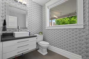 Half bath with toilet and vanity