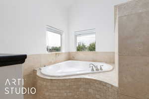 Full bath featuring a garden tub