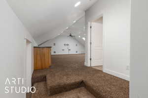 Bonus room with lofted ceiling, recessed lighting, baseboards, ceiling fan, and carpet floors