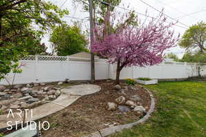 View of yard featuring a fenced backyard