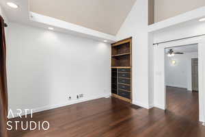 Spare room with a ceiling fan, recessed lighting, baseboards, visible vents, and dark wood-style floors