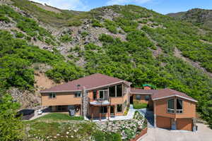 View from above of property featuring a mountain backdrop