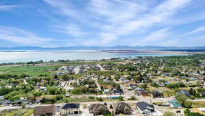 Aerial view featuring a water and mountain view and a residential view