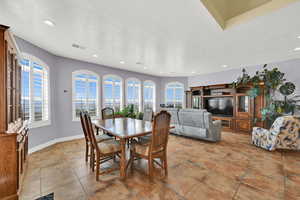 Dining space with baseboards, visible vents, and recessed lighting