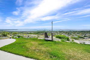 Exterior space featuring a water and mountain view