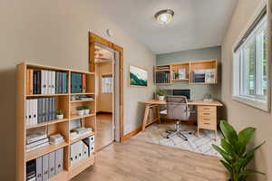 2nd bedroom/office with LVP floors and  wood baseboards