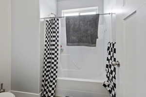 Full bathroom with toilet