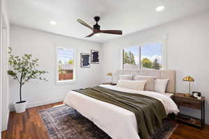 Bedroom with wood finished floors, recessed lighting, baseboards, and ceiling fan