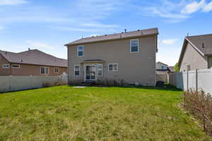 Rear view of property with central air condition unit