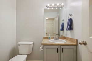 Bathroom with toilet and vanity