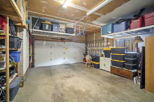 Garage featuring a garage door opener