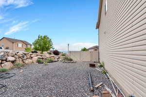 View of yard with a gate