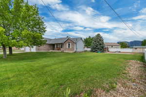 View of yard with an attached garage