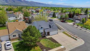 Aerial view of residential area with a mountainous background