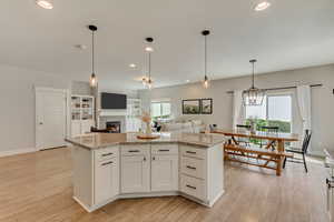 Kitchen with a wealth of natural light and recessed lighting