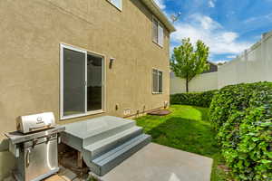 View of yard featuring fence and a wooden deck