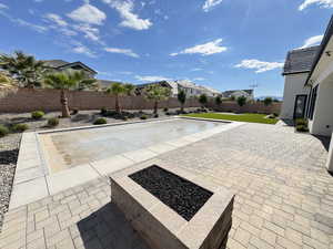 Motorized cover on pool and fire pit