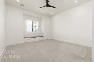 Spare room with recessed lighting, light colored carpet, ceiling fan, and baseboards