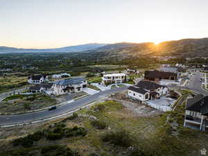 Aerial view at dusk of a mountain view and a residential view
