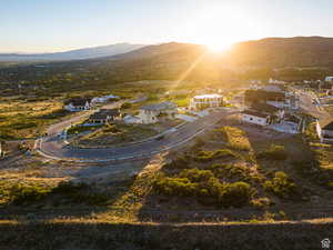 View of property location with a mountainous background and nearby suburban area