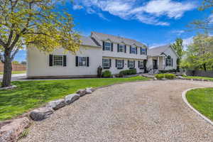 Front Yard with large half-circle driveway