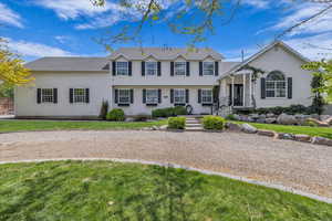 Front Yard with large half-circle driveway