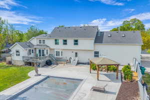 Rear view of property featuring Pool and Deck