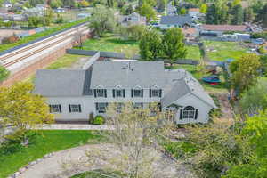 Aerial view of property's location with Large Extra parking to the left side of the lot