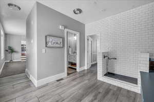 Mud room with lockers and direct access to the pool, including a dog wash,  Full Bathroom and Bedroom