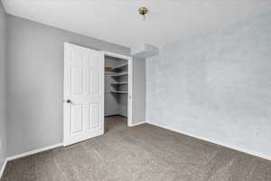 (3 ADU) Bedroom with baseboard heating and large walk-in closet