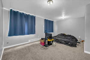 (1 ADU) Bedroom with baseboard heating