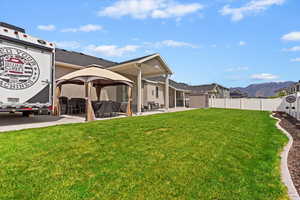 View of yard with a patio