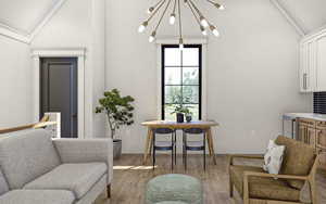 Interior space featuring a notable chandelier, wood finished floors, and lofted ceiling