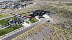 Aerial perspective of suburban area with property parcel outlined