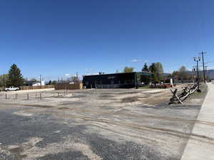 View of yard featuring fence
