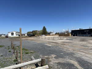 View of yard featuring fence