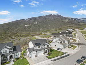 Aerial view of residential area with a mountain backdrop