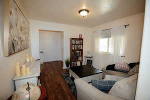 Living area with wood finished floors