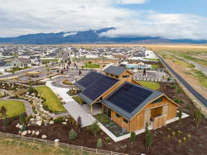 Aerial perspective of suburban area featuring a mountainous background