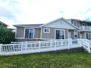 View of front of house with a front yard