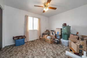 Storage room featuring a ceiling fan