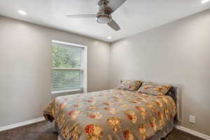 Bedroom featuring carpet floors, baseboards, recessed lighting, and ceiling fan