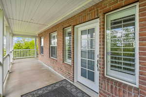 Balcony featuring covered porch