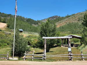 Surrounding community featuring fence and a view of countryside