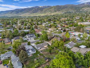 Aerial view of residential area with a mountain backdrop